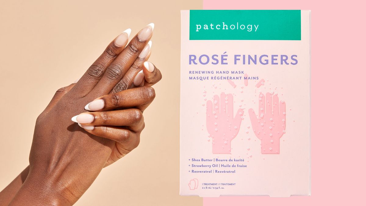 Well-groomed hands with neutral manicured nails beside Patchology Rosé Fingers renewing hand mask packaging, highlighting a nourishing, softening treatment for dry hands.