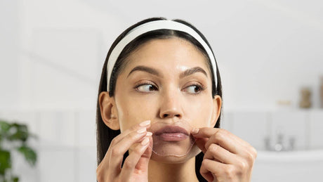 woman wearing hydrating lip gels